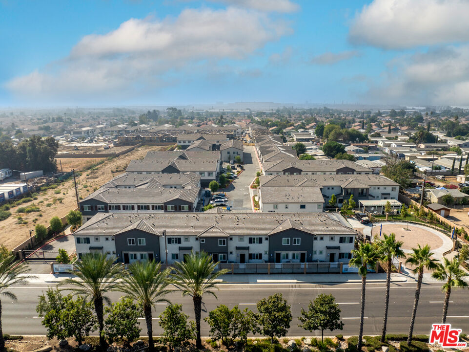 an aerial view of residential building with outdoor space