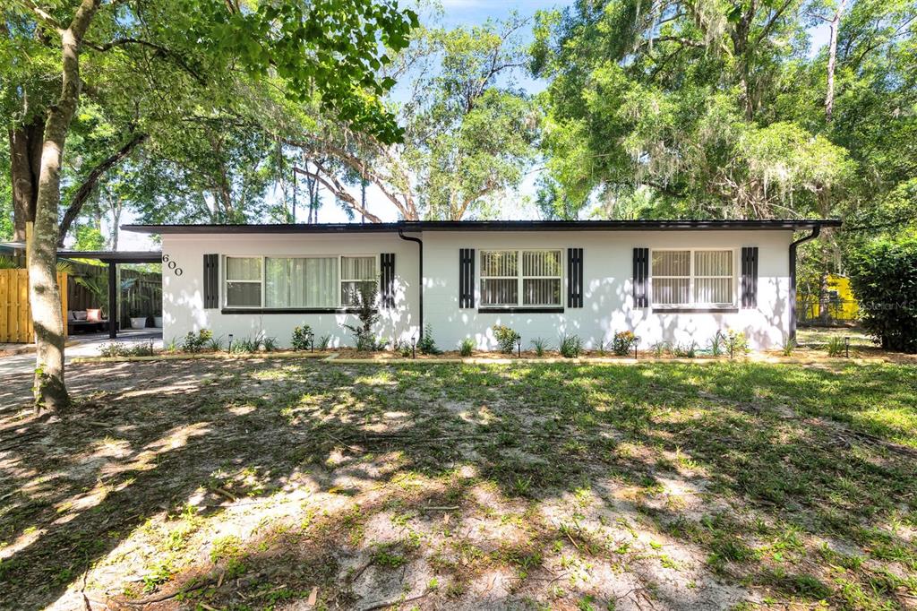 front view of house with a yard