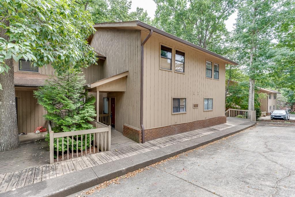 a house with trees in front of it