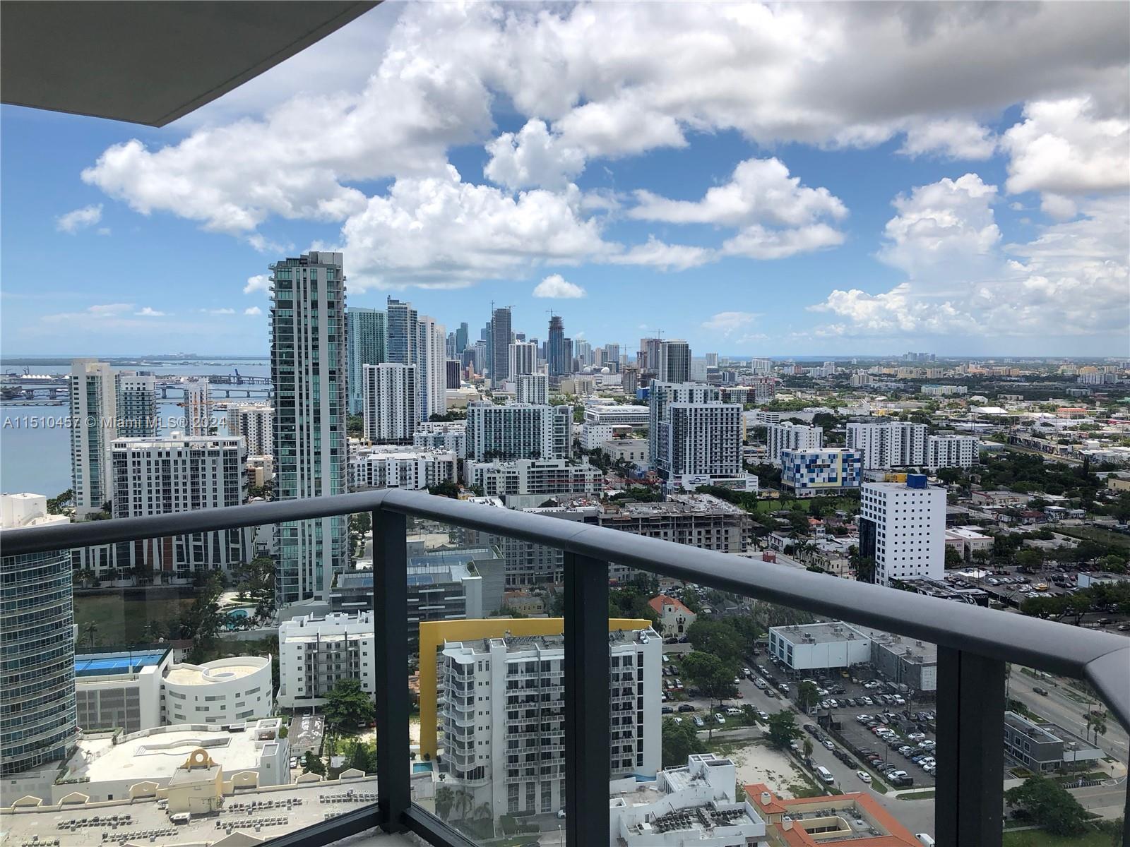 a city view from a balcony