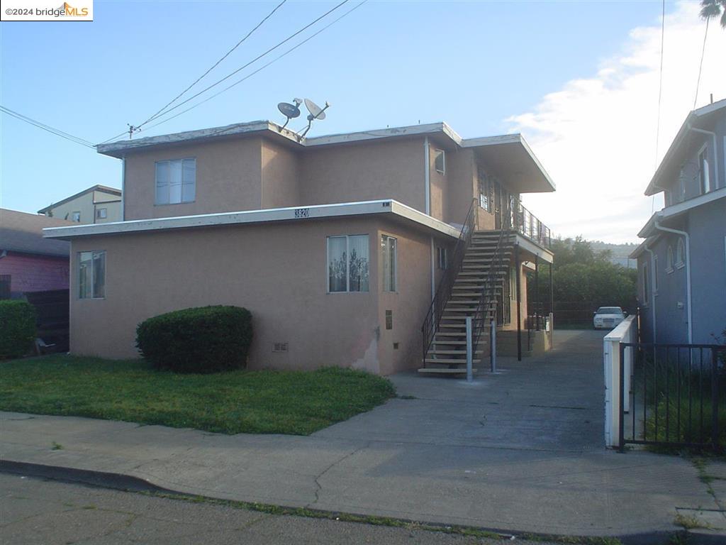 a front view of a house with garage