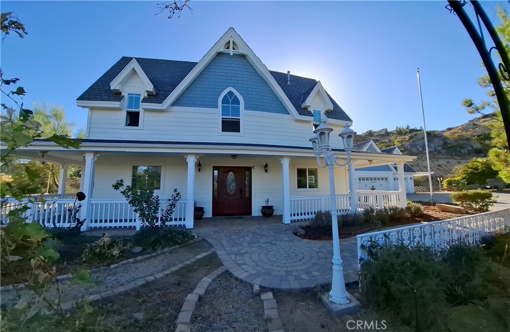 a front view of a house with a porch