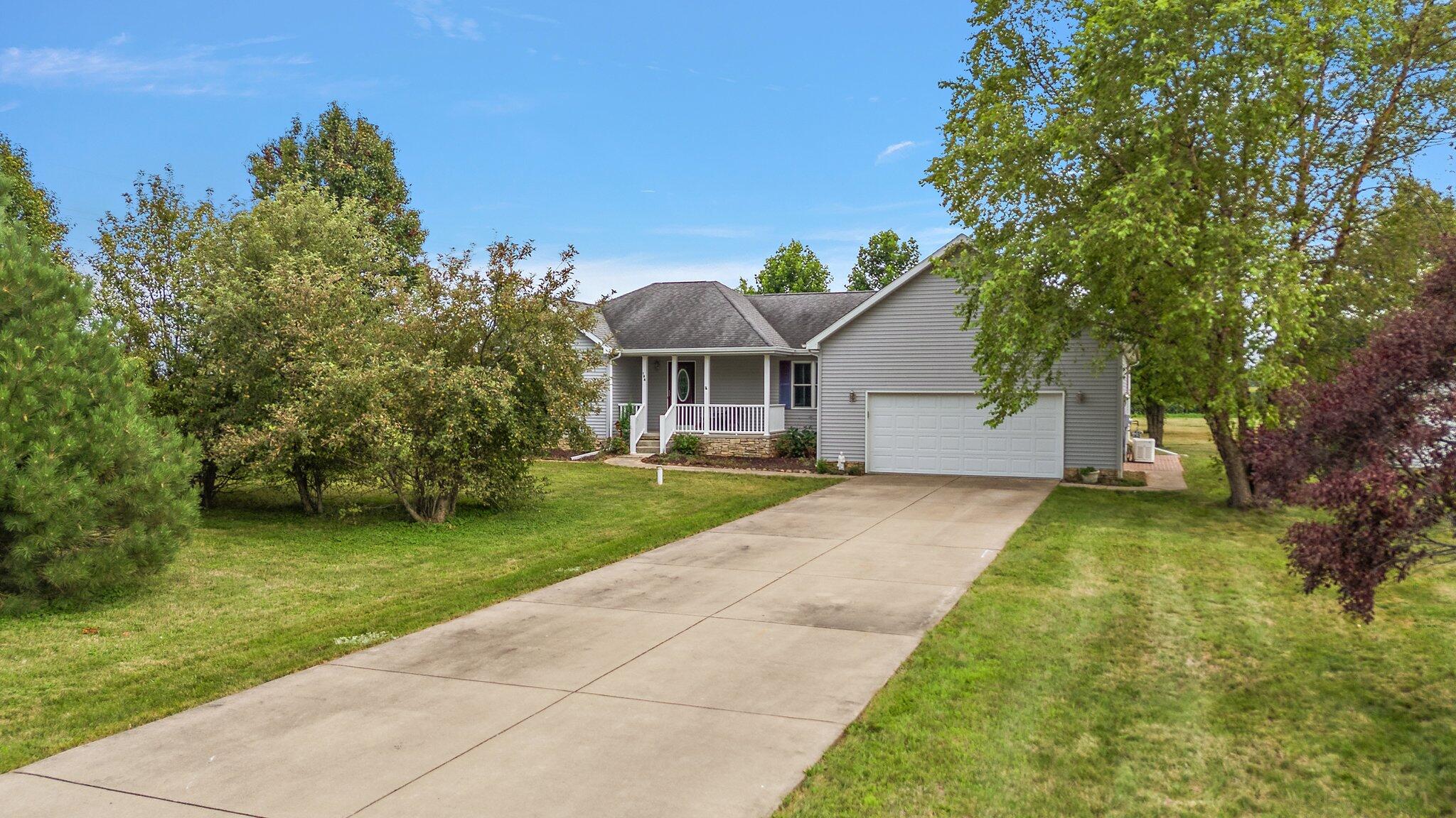 front view of a house with a yard