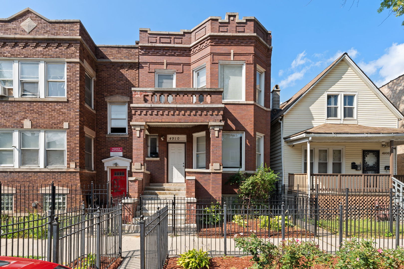 front view of a house with a street