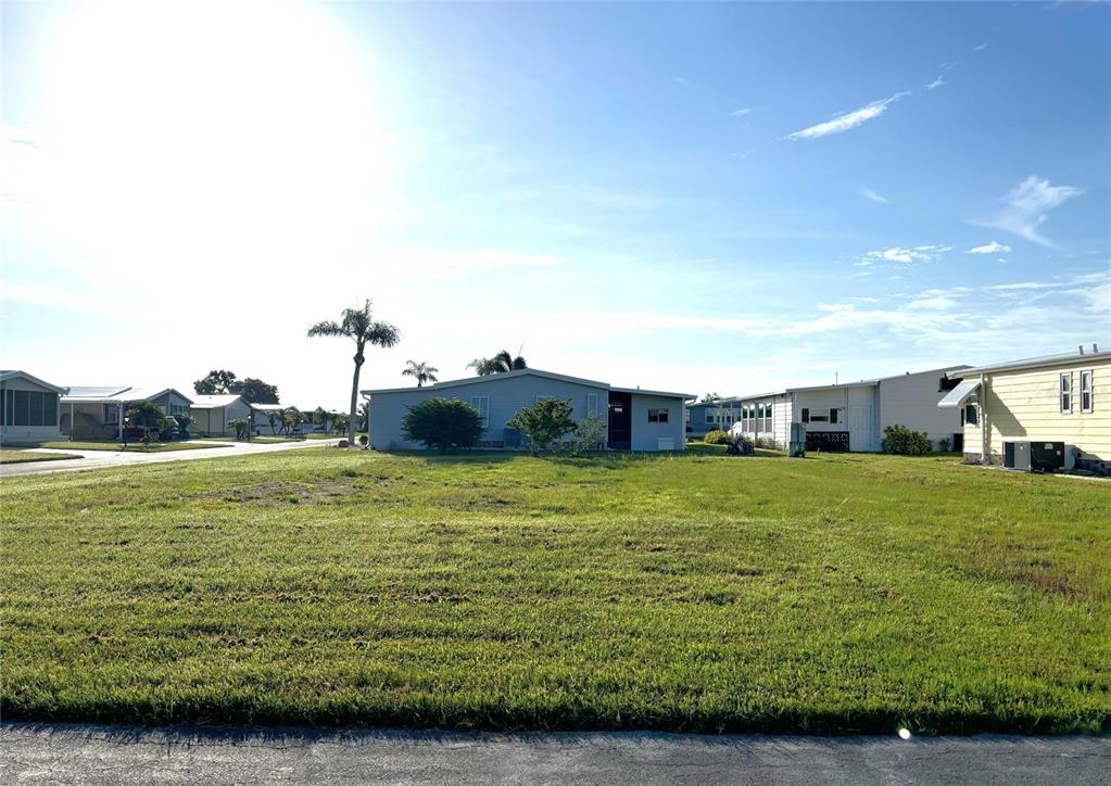 a view of a large building with yard