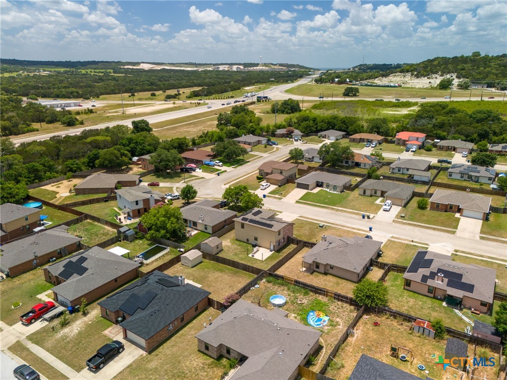 an aerial view of residential building with outdoor space