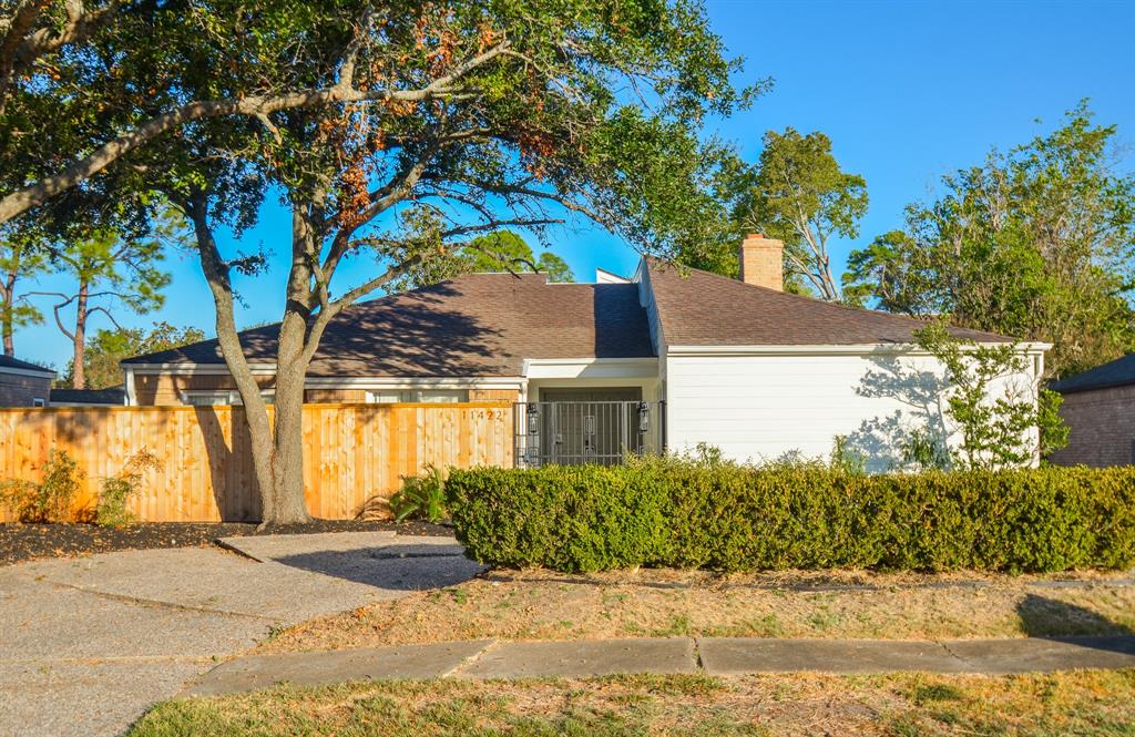 a house view with a garden space