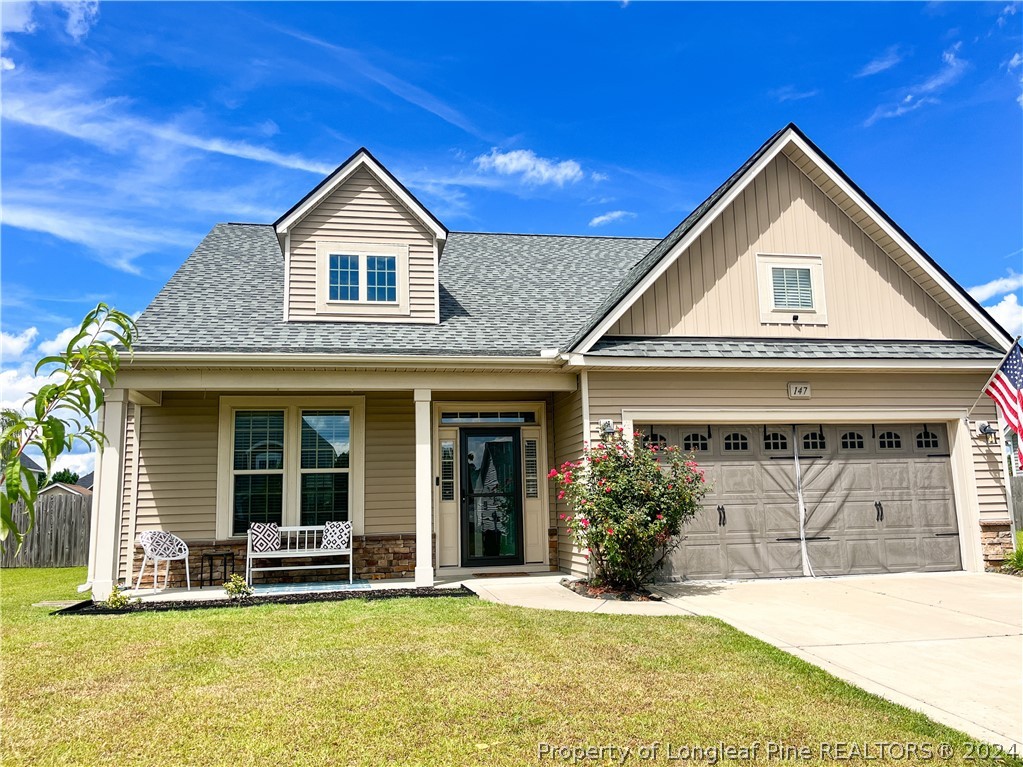 front view of a house with a yard