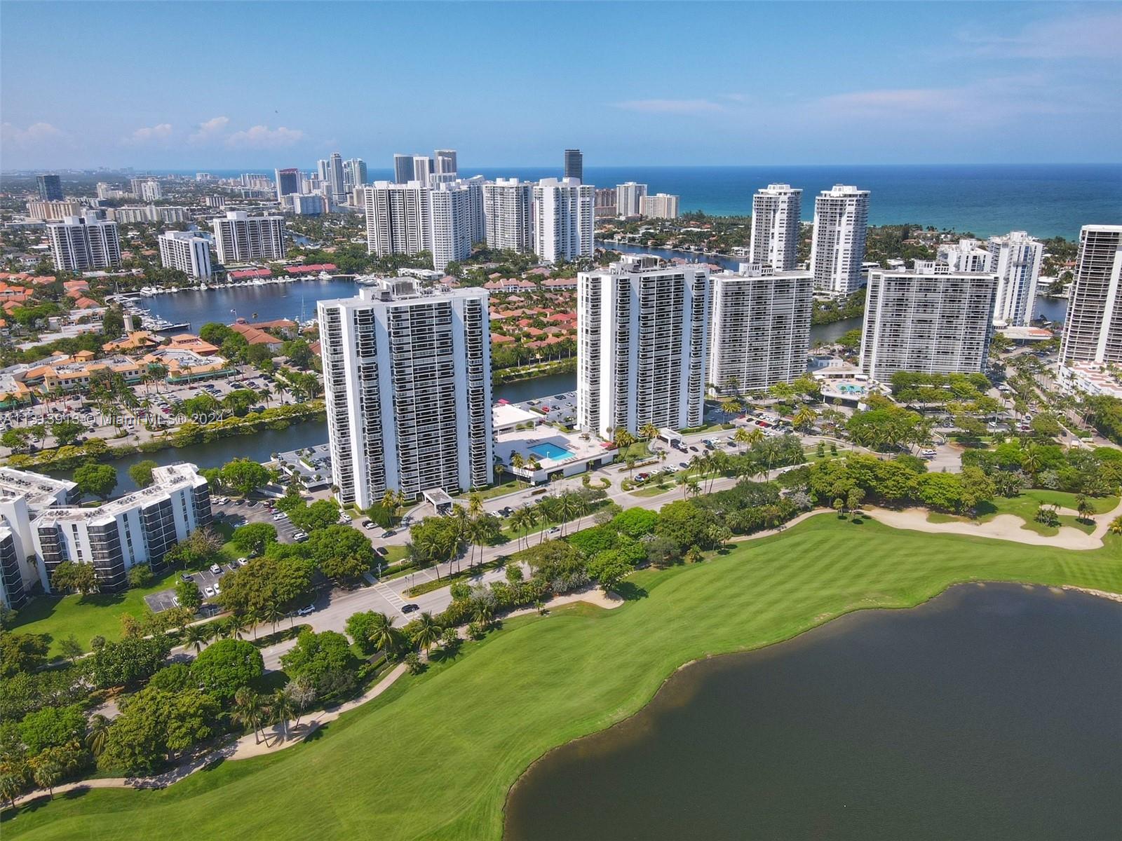 a view of a city with tall buildings