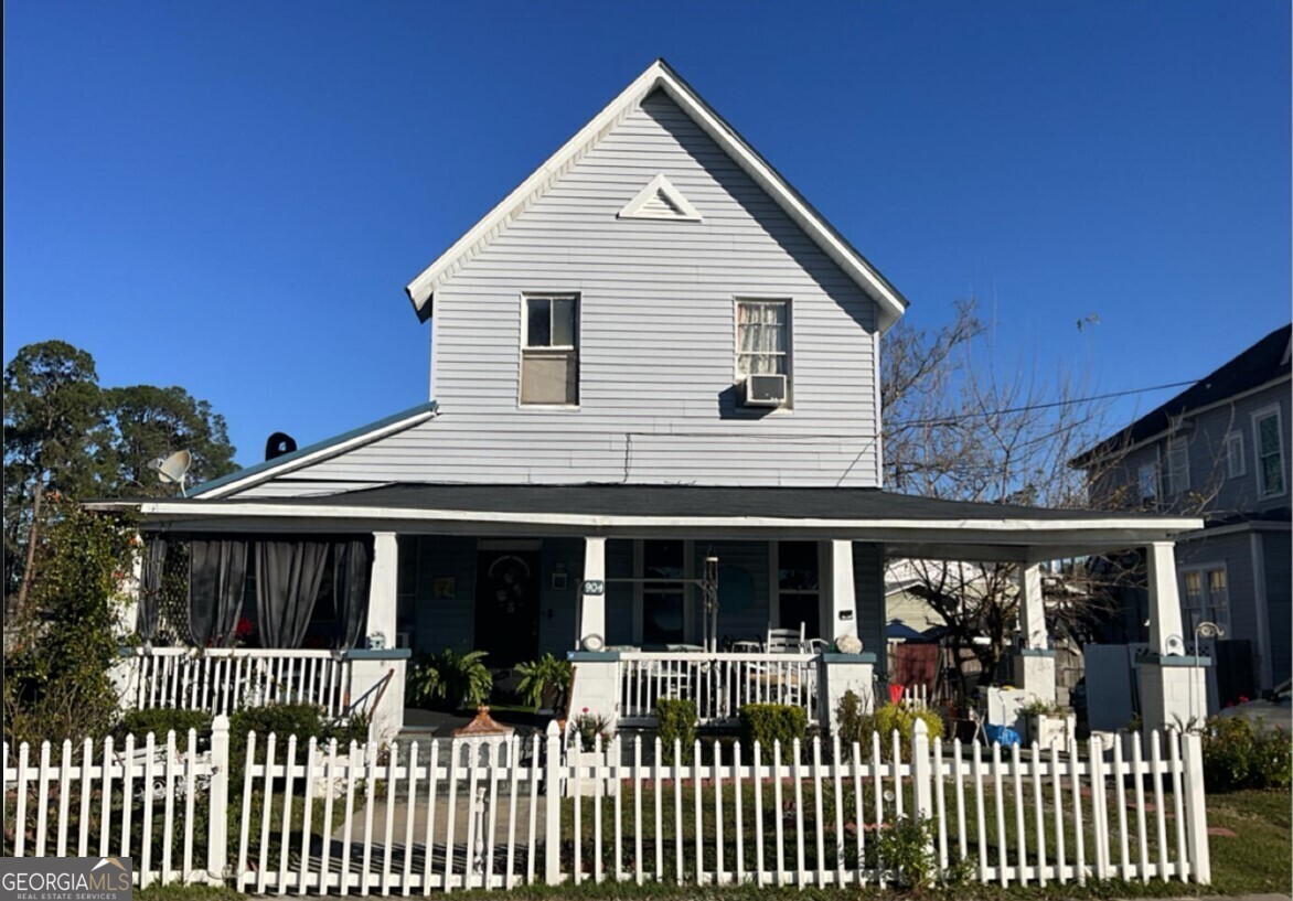 a front view of house with a yard