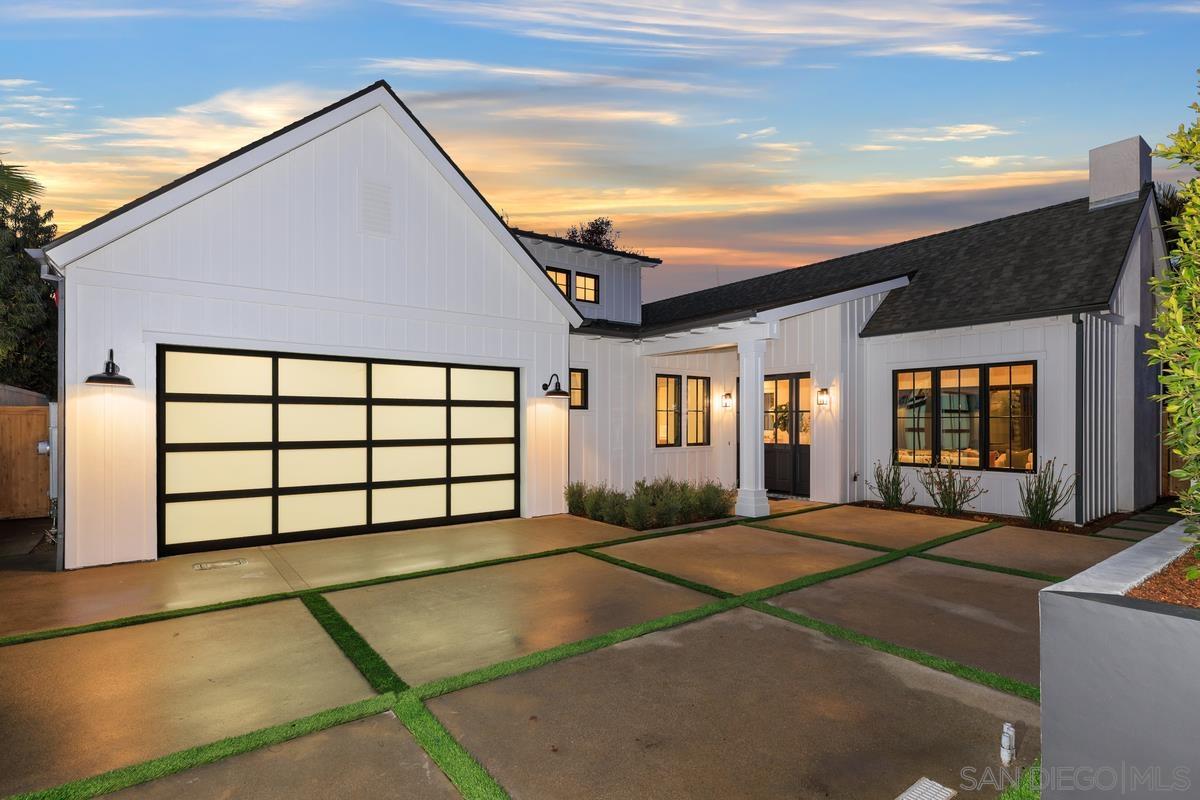 a front view of a house with a garage