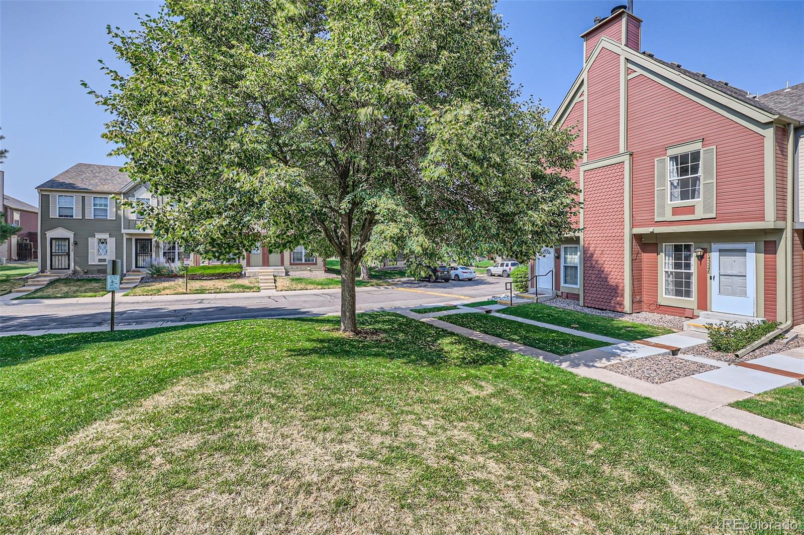 a view of a house with a yard