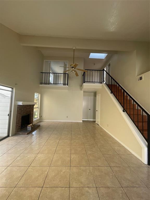 a view of a livingroom with washer and dryer