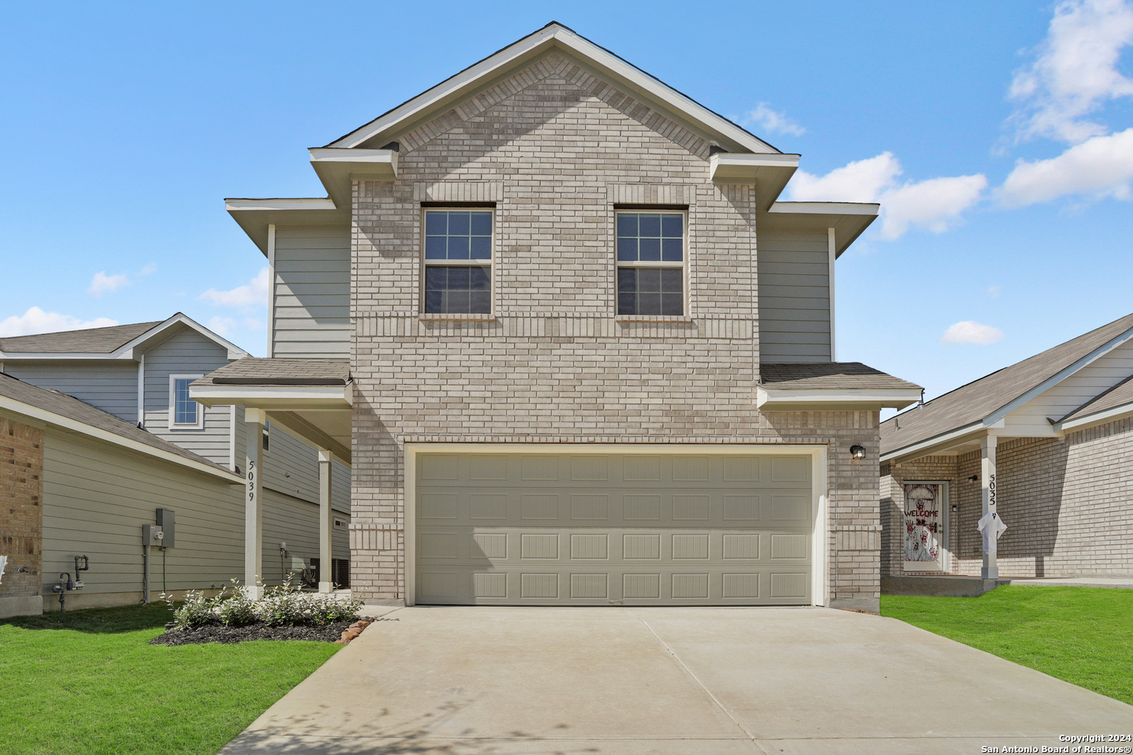 a front view of house with yard