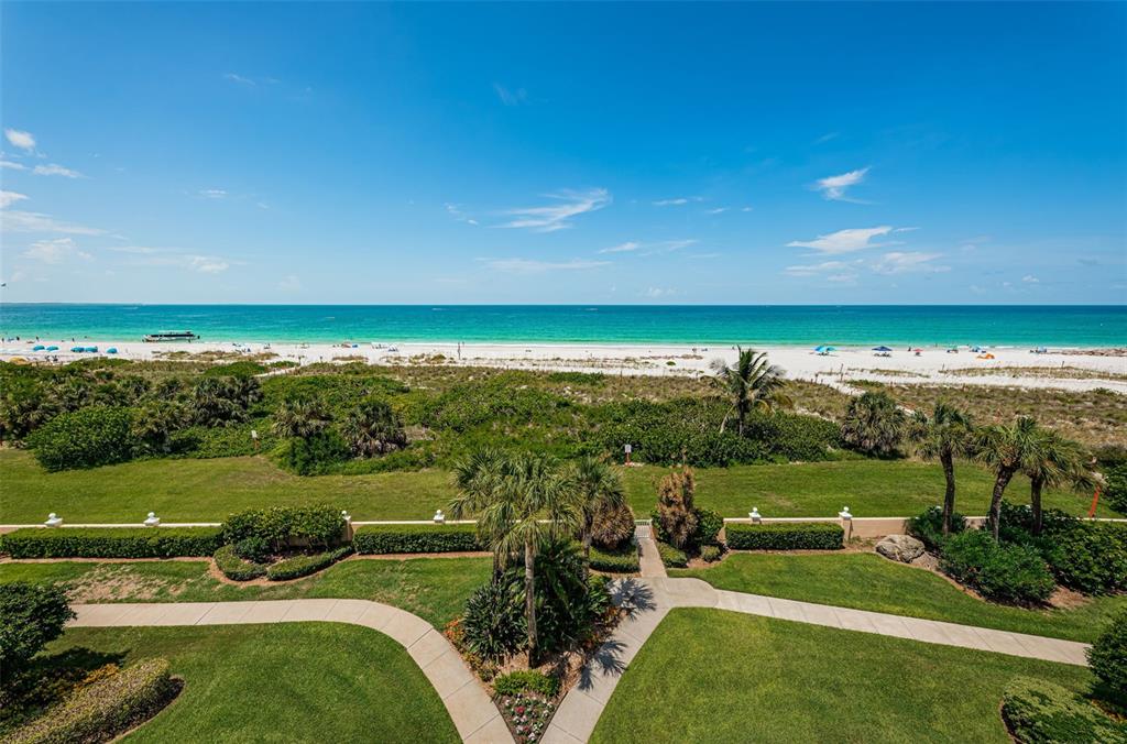 an aerial view of a golf course with a big yard