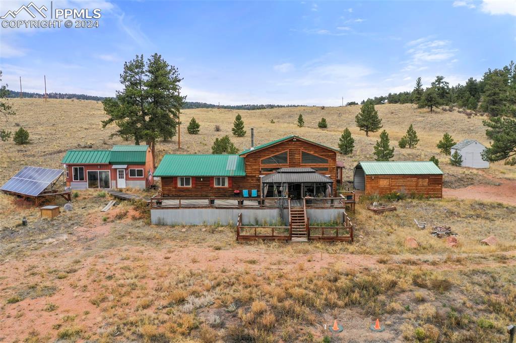 Front view of property with the workshop and oversized carport