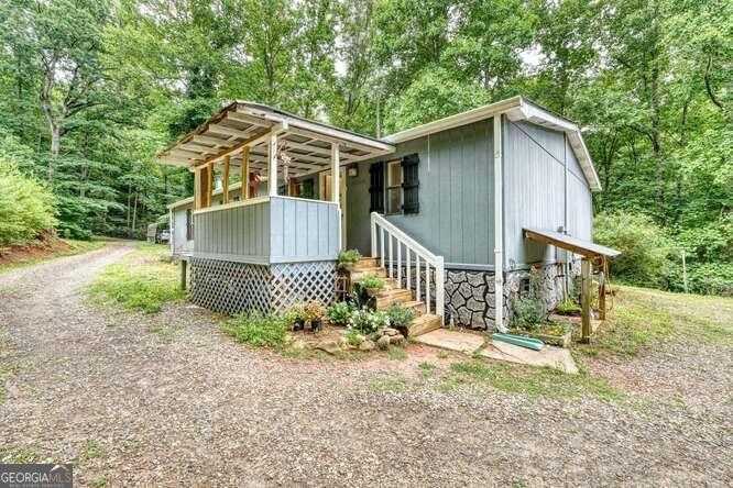 front view of house with wooden fence