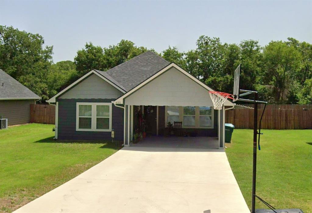 a house view with a garden space