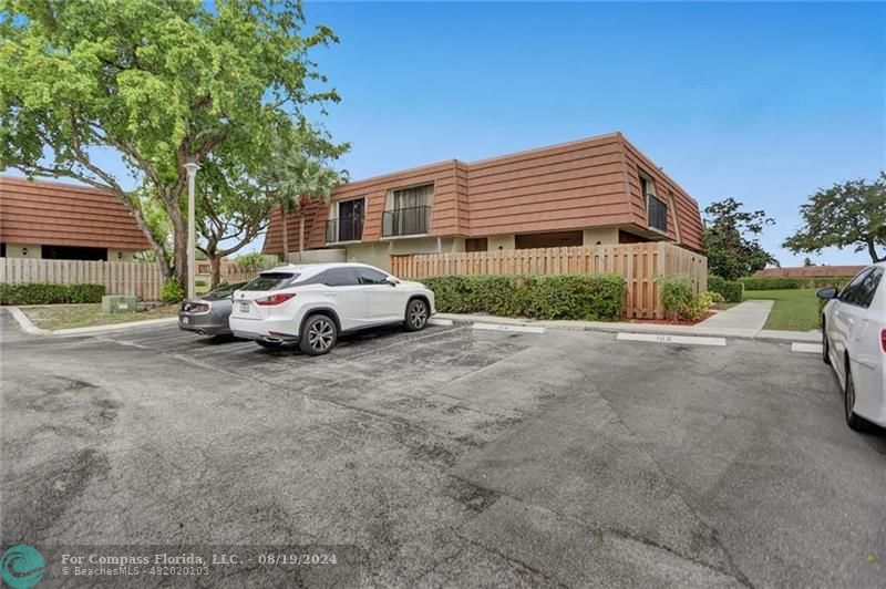 a car parked in front of a house