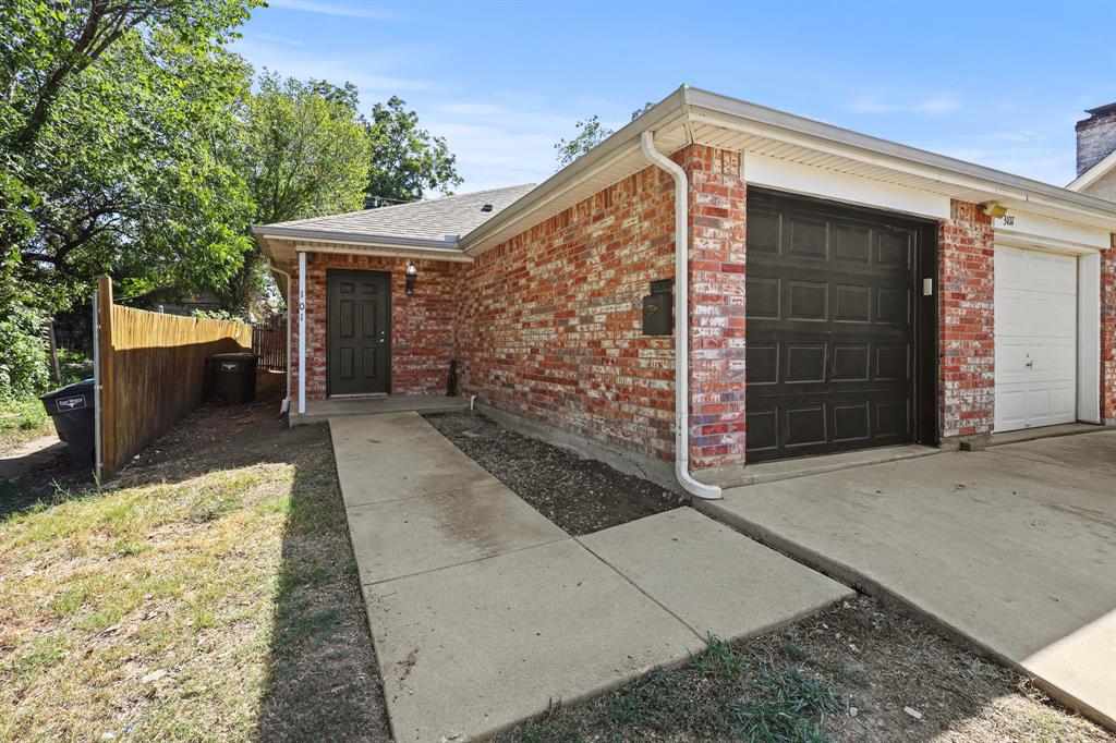 a front view of a house with a garage