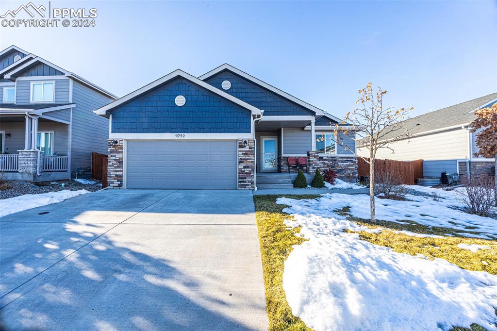 Craftsman-style home with a garage