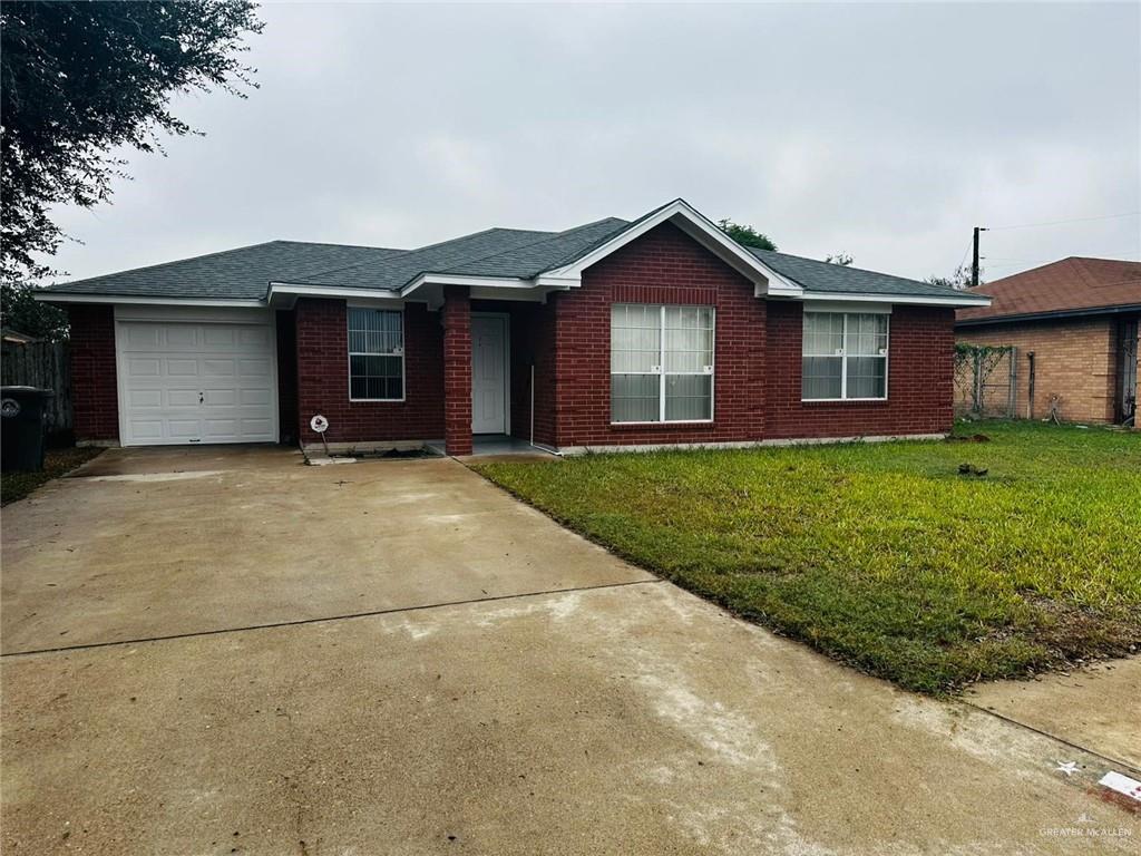 a view of a yard in front of a house with a yard