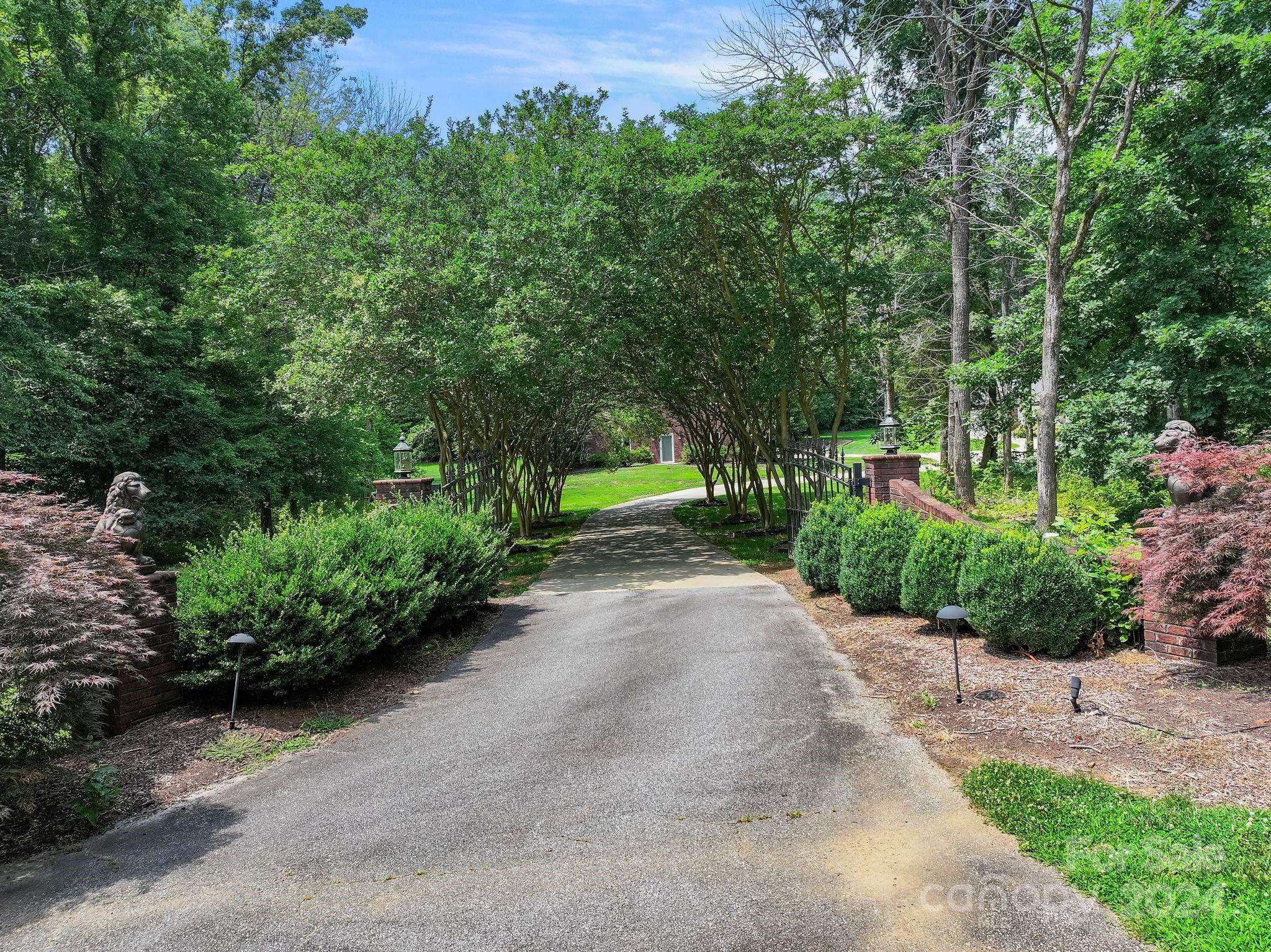 a view of a street with a park