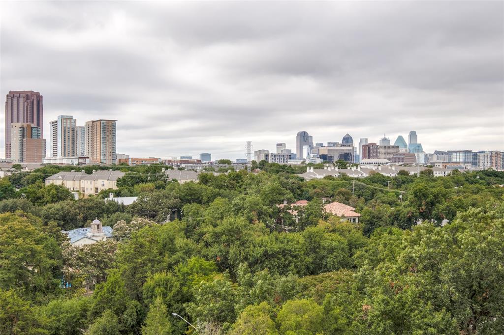 a view of a city with tall buildings