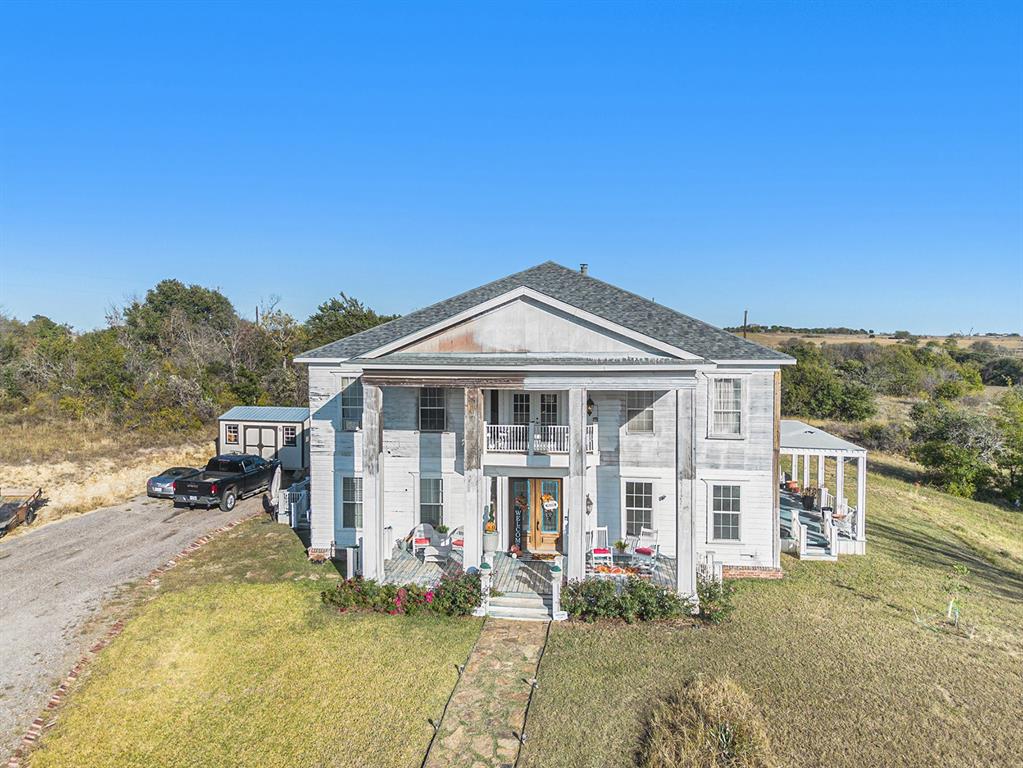 a front view of a house with a porch