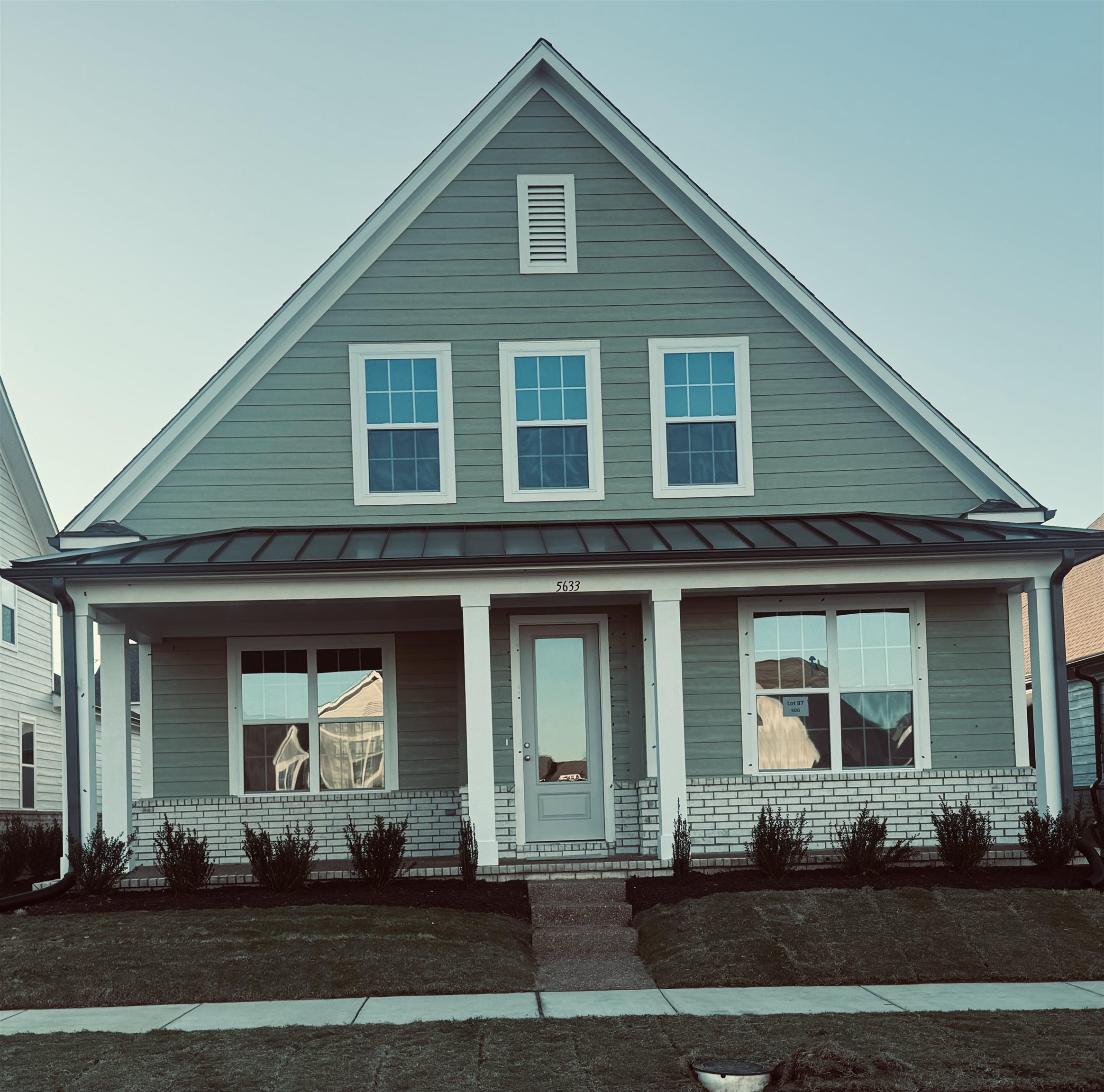 View of front facade with covered porch