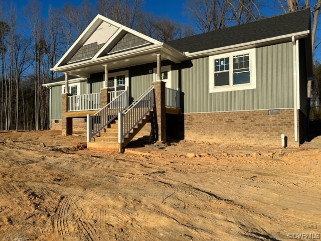 a house with trees in the background