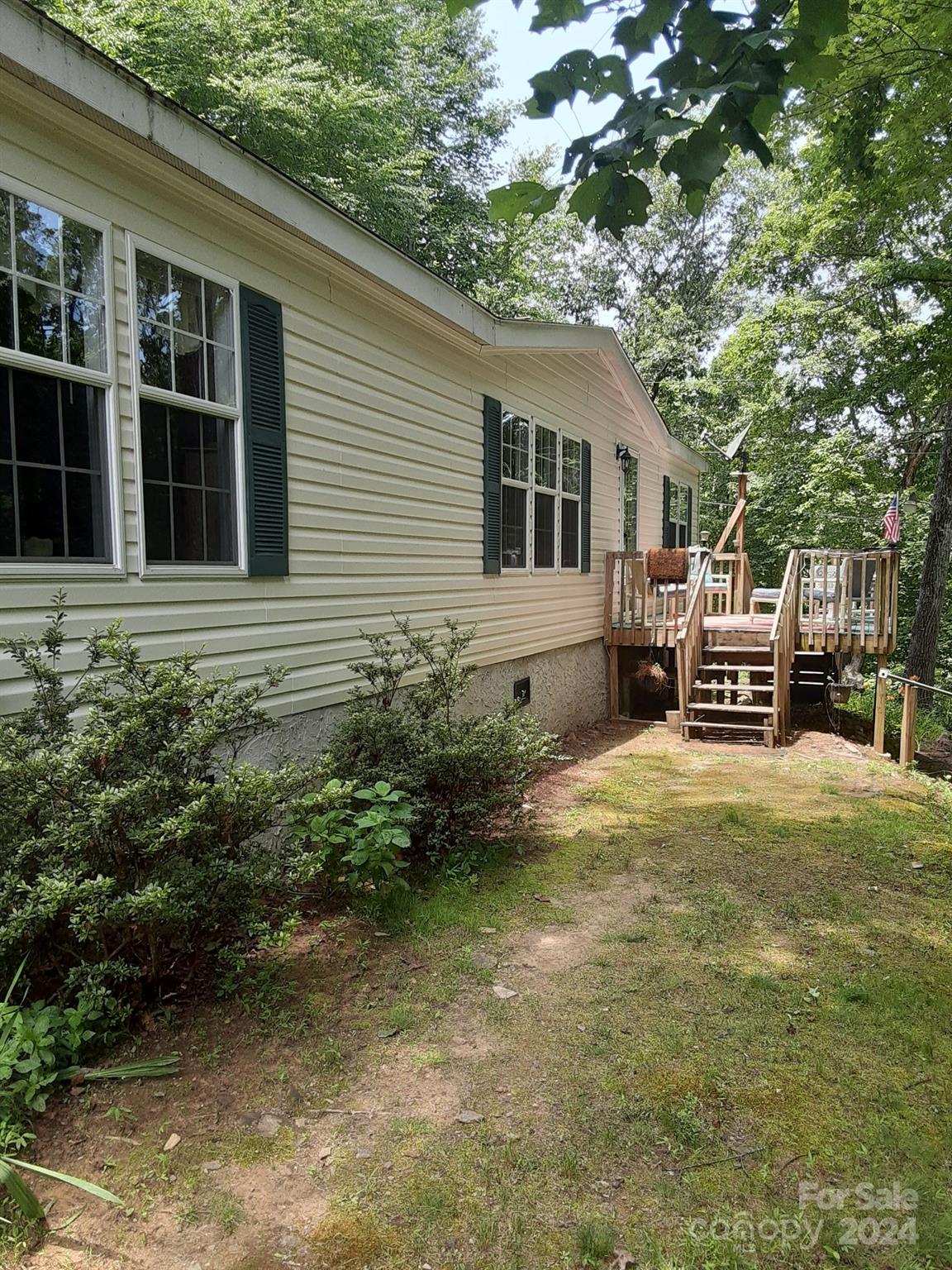 a house view with a garden space