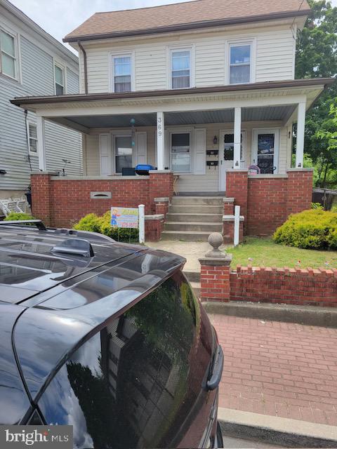 a view of house with outdoor space