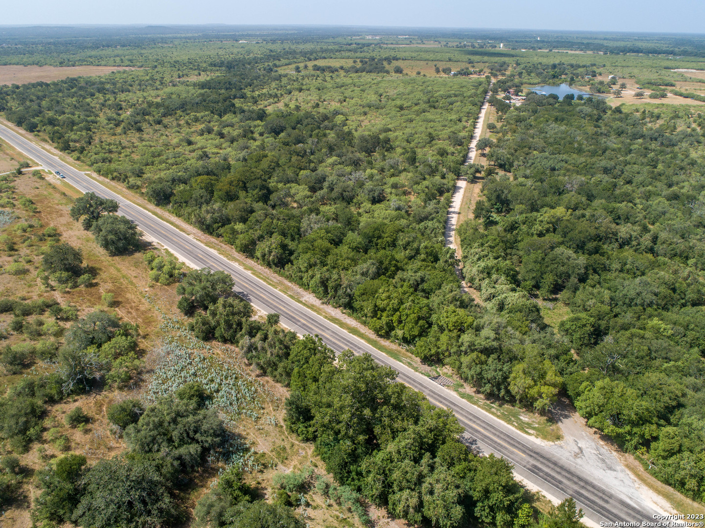 a view of a green landscape from a balcony