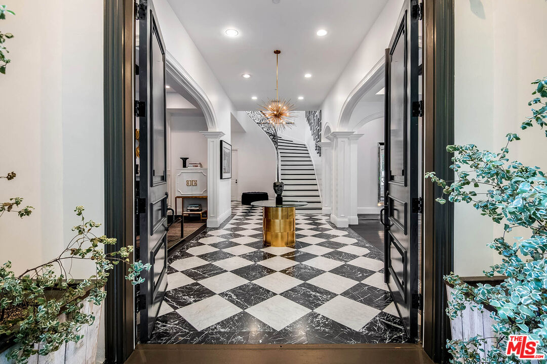 an entryway of a house with a patio