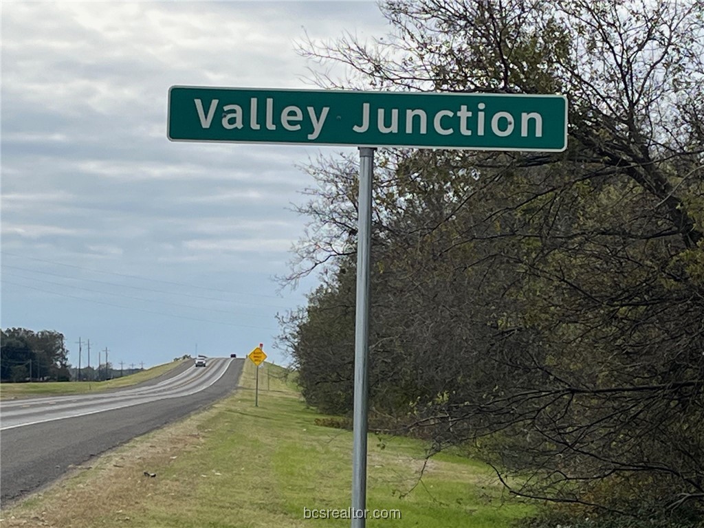 a sign of street sign on a road