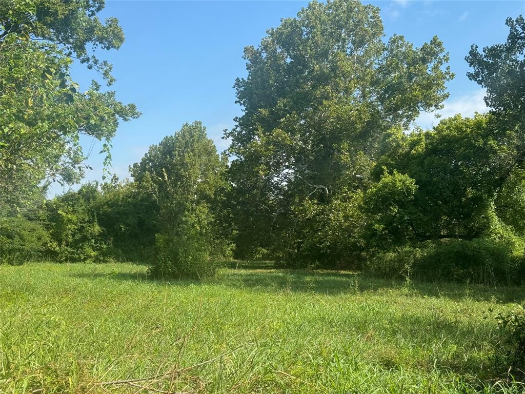 a view of outdoor space with a lake view