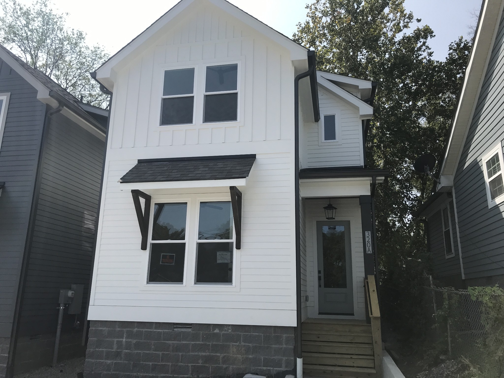 a front view of a house with a door