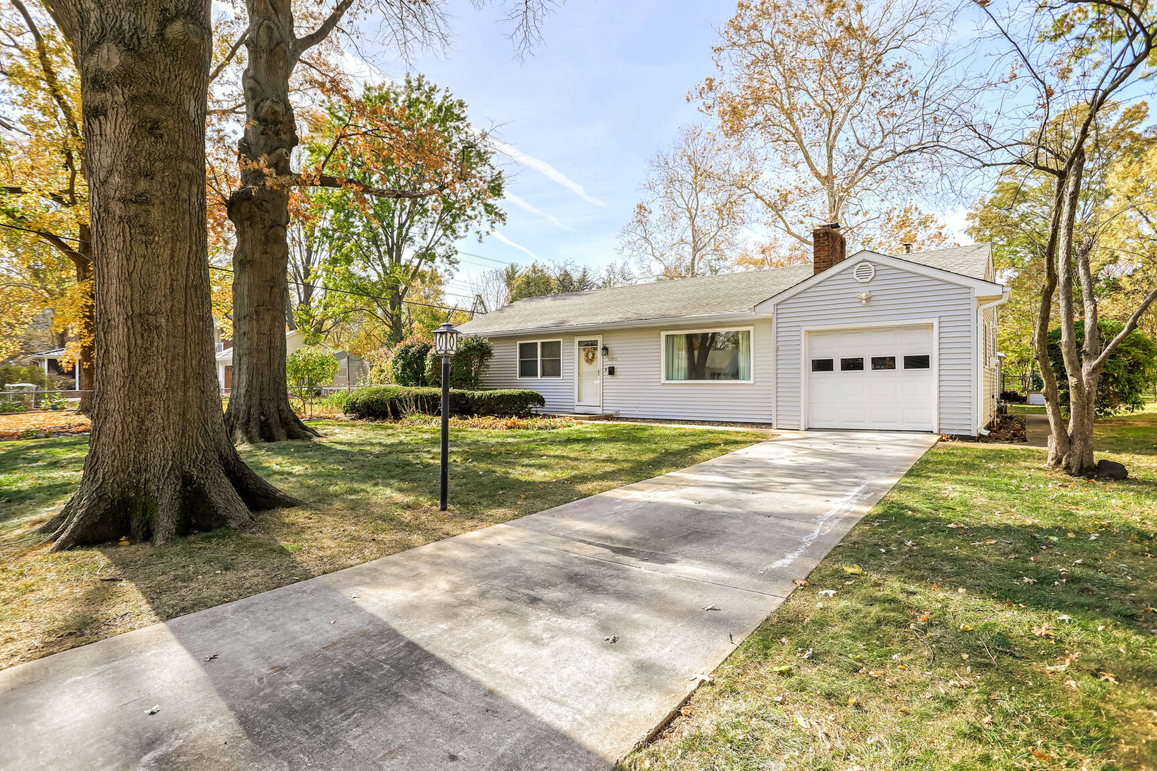 a house with trees in the background