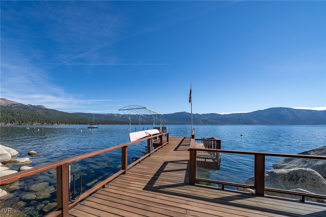 a view of a terrace with a lake view