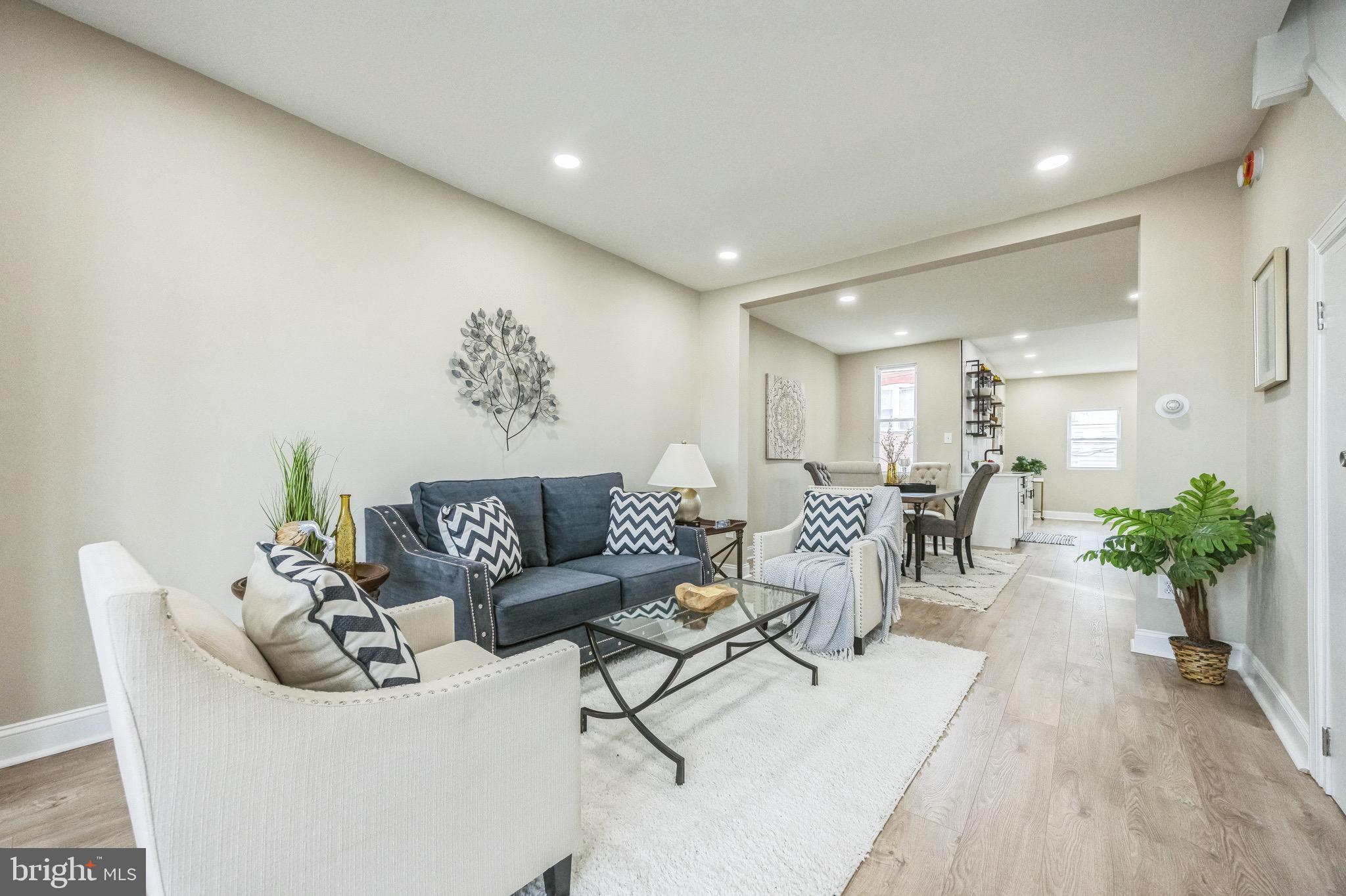 a living room with furniture and a couch