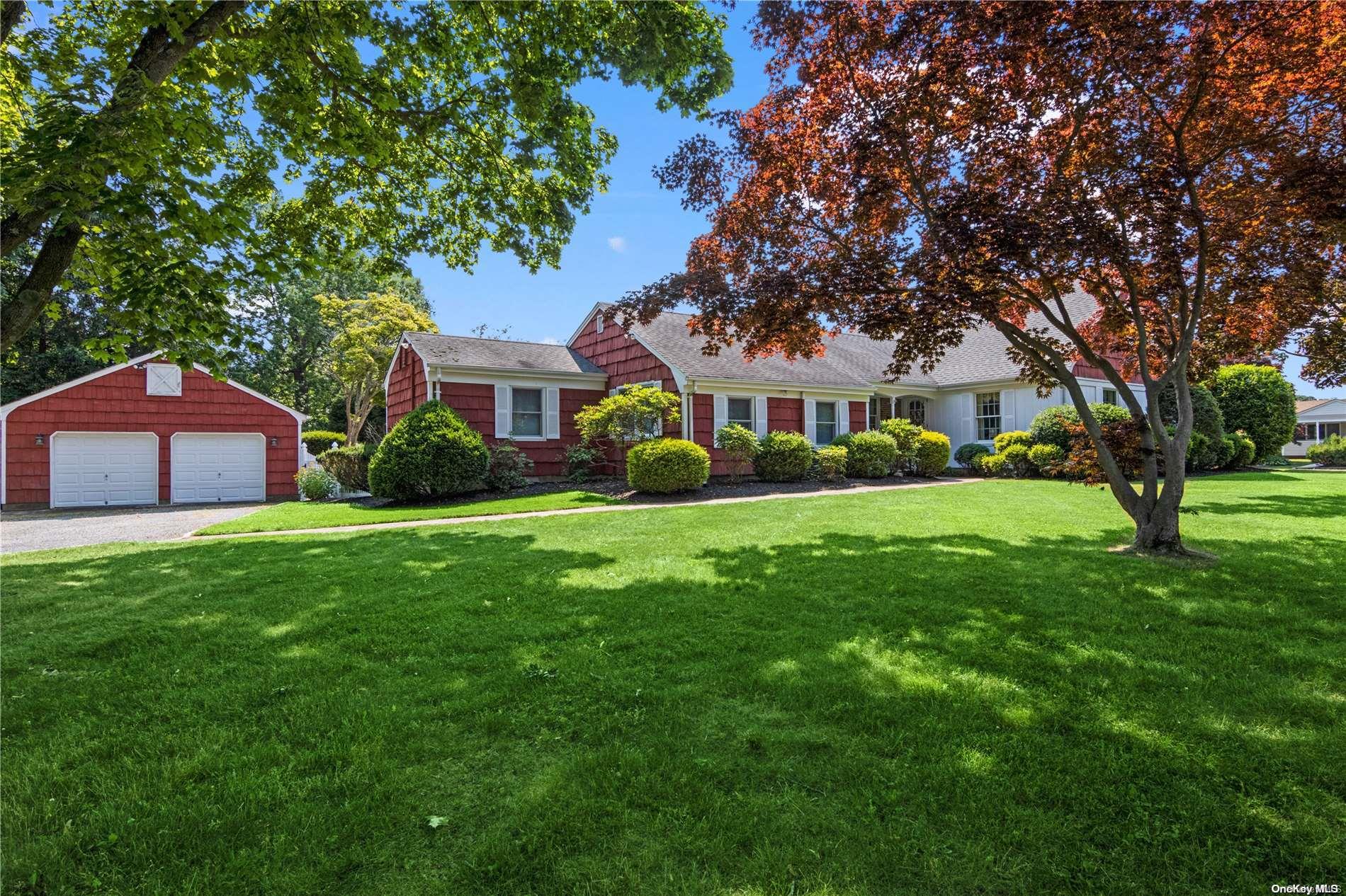 a view of house with yard