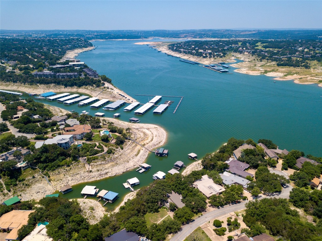 a aerial view of a house with a lake view