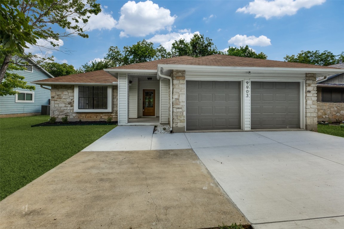 front view of a house with a yard