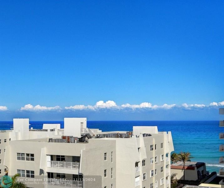 a view of city with ocean view