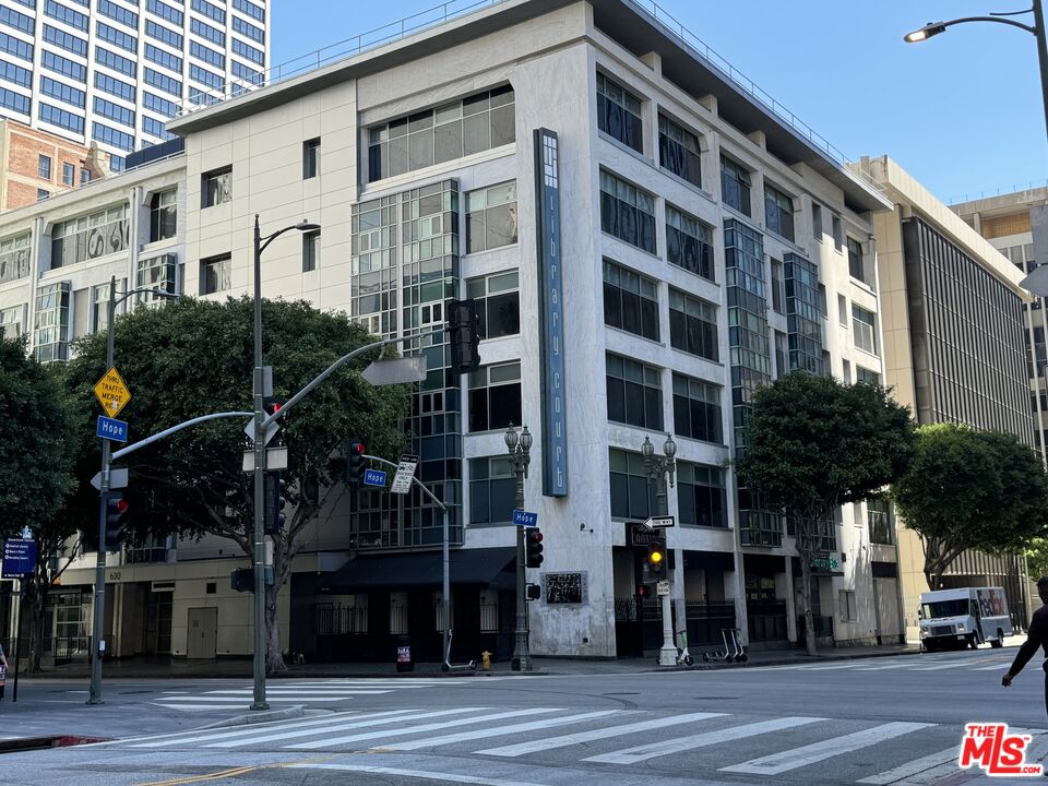 a view of a building with a street