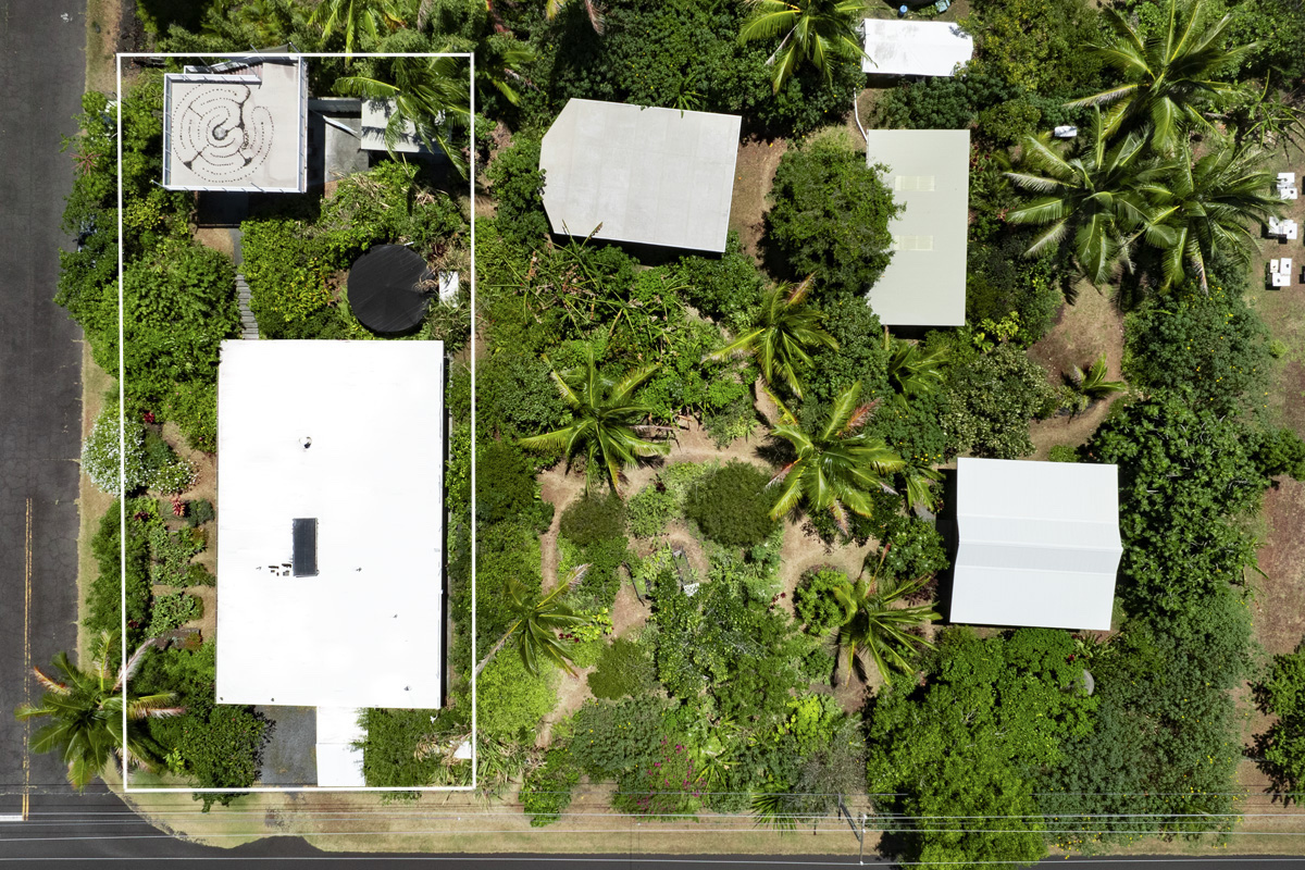 an aerial view of house with yard