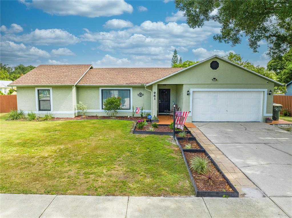 a front view of house with outdoor seating