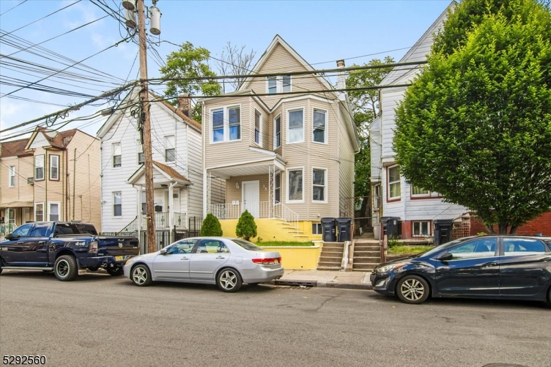 a car parked in front of a house