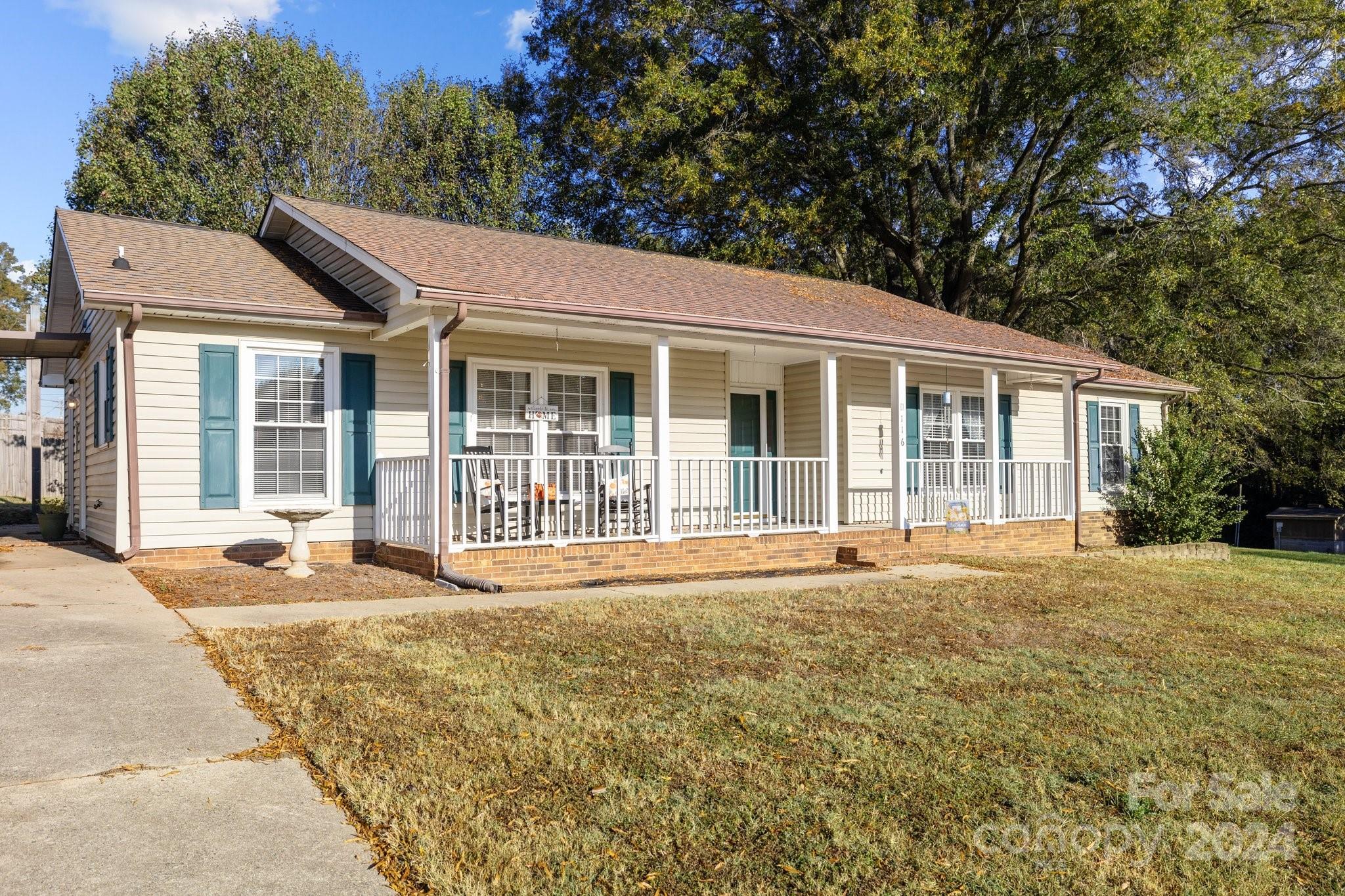 front view of a house with a patio